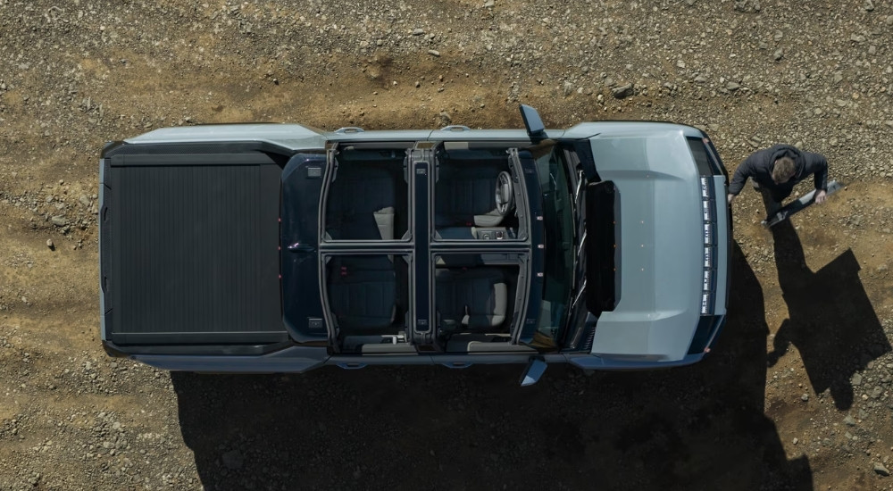 Aerial view a blue 2025 GMC Hummer EV Pickup