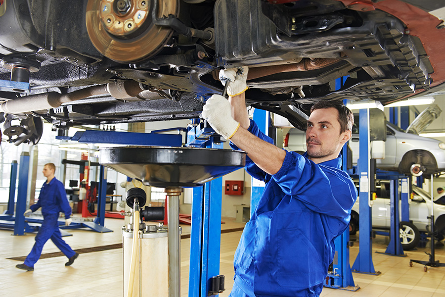 Service technician performing maintenance at LaFontaine Buick GMC St. Clair