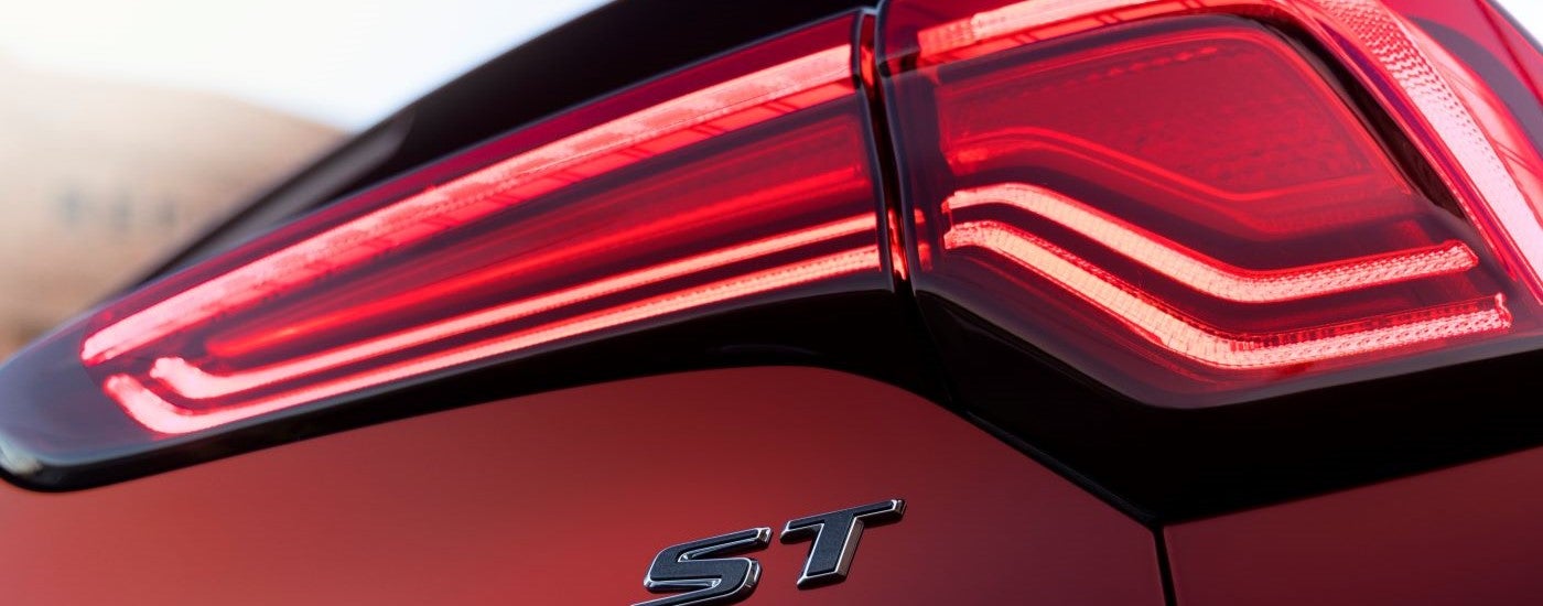Close up of the brake light on a red 2024 Buick Encore ST