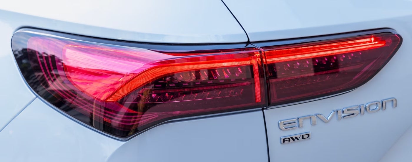 Close up of the tail light on a white 2025 Buick Envision