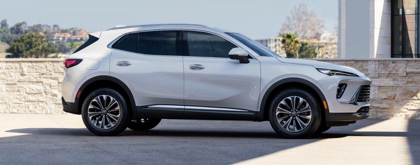 White 2024 Buick Envision for sale near Clinton Township parked on a driveway